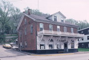 215 N MAIN ST, a Side Gabled general store, built in Alma, Wisconsin in 1861.