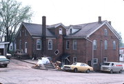 215 N MAIN ST, a Side Gabled general store, built in Alma, Wisconsin in 1861.