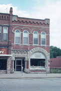 126 S EAU CLAIRE ST, a Romanesque Revival bank/financial institution, built in Mondovi, Wisconsin in 1891.