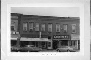 131-9 S EAU CLAIRE ST, a Commercial Vernacular small retail building, built in Mondovi, Wisconsin in 1891.