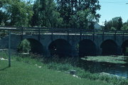 WEEKS RD, OVER PINE CREEK, 200 FT N OF CENTER ST WEEKS RD, OVER PINE CREEK, 200 FT N OF CENTER ST, a NA (unknown or not a building) bridge, built in Charlestown, Wisconsin in 1901.