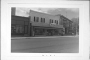 2105 MAIN ST, a Commercial Vernacular large retail building, built in New Holstein, Wisconsin in 1906.
