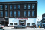 207-209 N BRIDGE ST, a Astylistic Utilitarian Building large retail building, built in Chippewa Falls, Wisconsin in 1885.
