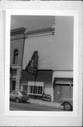 107 N BRIDGE ST, a Commercial Vernacular small retail building, built in Chippewa Falls, Wisconsin in 1886.