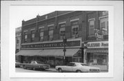 208 N BRIDGE ST, a Commercial Vernacular large retail building, built in Chippewa Falls, Wisconsin in 1890.