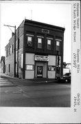 514 N BRIDGE ST, a Commercial Vernacular small retail building, built in Chippewa Falls, Wisconsin in 1907.