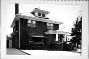 704 W DOVER ST, a American Foursquare house, built in Chippewa Falls, Wisconsin in 1925.