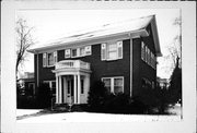 705 W DOVER ST, a Colonial Revival/Georgian Revival house, built in Chippewa Falls, Wisconsin in 1927.