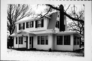 715 W DOVER ST, a Dutch Colonial Revival house, built in Chippewa Falls, Wisconsin in 1925.