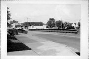 GRAND AVE, a NA (unknown or not a building) steel beam or plate girder bridge, built in Chippewa Falls, Wisconsin in 1935.