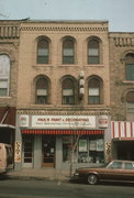 111 E JAMES, a Italianate small retail building, built in Columbus, Wisconsin in 1856.