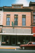 152 W JAMES, a Commercial Vernacular small retail building, built in Columbus, Wisconsin in 1895.