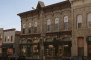 114-118 N LUDINGTON, a Early Gothic Revival large retail building, built in Columbus, Wisconsin in 1877.