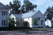 214 W HOWARD ST, a Greek Revival church, built in Portage, Wisconsin in 1855.