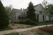 214 W HOWARD ST, a Greek Revival house of worship, built in Portage, Wisconsin in 1855.