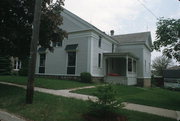 214 W HOWARD ST, a Greek Revival house of worship, built in Portage, Wisconsin in 1855.