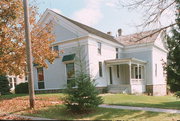 214 W HOWARD ST, a Greek Revival house of worship, built in Portage, Wisconsin in 1855.