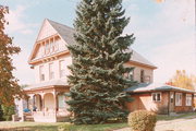 235 W PLEASANT ST, a Queen Anne house, built in Portage, Wisconsin in 1897.