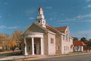 417 W WISCONSIN ST, a Colonial Revival/Georgian Revival church, built in Portage, Wisconsin in 1933.