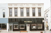 136 W COOK ST, a Italianate large retail building, built in Portage, Wisconsin in 1869.