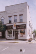 201 W DEWITT, a Commercial Vernacular small retail building, built in Portage, Wisconsin in 1899.
