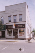 201 W DEWITT, a Commercial Vernacular retail building, built in Portage, Wisconsin in 1899.