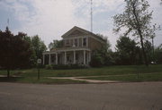 532 W WISCONSIN ST, a Greek Revival house, built in Portage, Wisconsin in 1855.