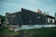 RIO ST, a Astylistic Utilitarian Building depot, built in Rio, Wisconsin in 1916.