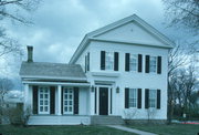 825 OAK ST, a Greek Revival house, built in Wisconsin Dells, Wisconsin in 1863.