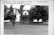 W1934 STATE HIGHWAY 60, a Gabled Ell house, built in Columbus, Wisconsin in 1910.
