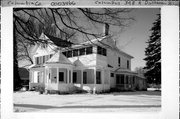 348 S DICKASON BLVD, a Greek Revival house, built in Columbus, Wisconsin in 1857.