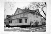 351-353 W JAMES ST, a Queen Anne duplex/two-flat, built in Columbus, Wisconsin in 1920.
