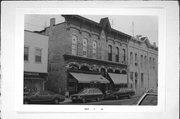 114-118 N LUDINGTON, a Early Gothic Revival large retail building, built in Columbus, Wisconsin in 1877.