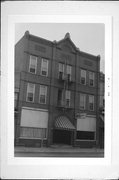 143-147 N LUDINGTON, a Romanesque Revival lodging-hotel, built in Columbus, Wisconsin in 1892.