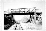 CHESTNUT ST AND CHICAGO & NORTHWESTERN RAILROAD TRACKS, a NA (unknown or not a building) bridge, built in Lodi, Wisconsin in 1896.