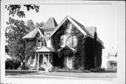 704 CASS, a Early Gothic Revival house, built in Portage, Wisconsin in 1855.