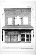 111 E COOK, a Commercial Vernacular small retail building, built in Portage, Wisconsin in 1911.