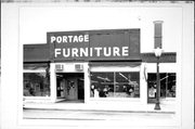 126 E COOK, a Commercial Vernacular large retail building, built in Portage, Wisconsin in 1917.