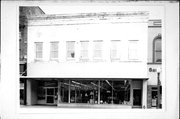 114 W COOK ST, a Commercial Vernacular large retail building, built in Portage, Wisconsin in 1876.