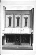 131 W COOK ST, a Commercial Vernacular small retail building, built in Portage, Wisconsin in 1868.