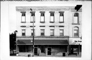 137-139 W COOK ST, a Commercial Vernacular retail building, built in Portage, Wisconsin in 1866.