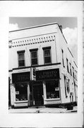 201 W DEWITT, a Commercial Vernacular retail building, built in Portage, Wisconsin in 1899.