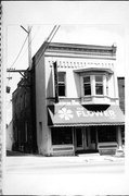 211 DEWITT, a Commercial Vernacular small retail building, built in Portage, Wisconsin in 1899.