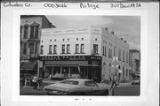 301 DEWITT ST, a Italianate large retail building, built in Portage, Wisconsin in 1873.