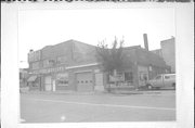 109 W EDGEWATER, a Commercial Vernacular automobile showroom, built in Portage, Wisconsin in 1917.