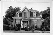 228 W FRANKLIN ST, a Second Empire house, built in Portage, Wisconsin in 1877.