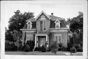 228 W FRANKLIN ST, a Second Empire house, built in Portage, Wisconsin in 1877.