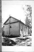 233 W HOWARD ST, a Romanesque Revival house of worship, built in Portage, Wisconsin in 1871.