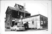 131 E MULLETT ST, a Astylistic Utilitarian Building grain elevator/feed mill, built in Portage, Wisconsin in 1862.
