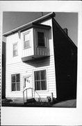 217 W ONEIDA ST, a Italianate small retail building, built in Portage, Wisconsin in 1894.